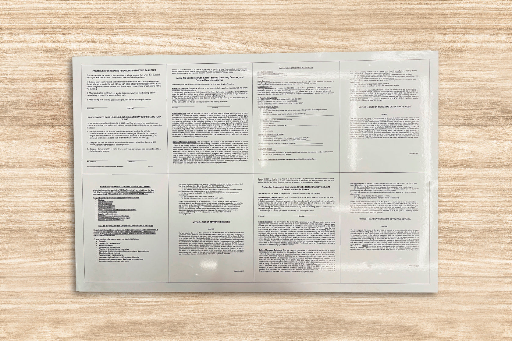 Folded paper with text on a wooden surface
