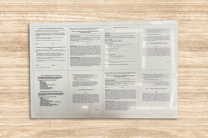Folded paper with text on a wooden surface